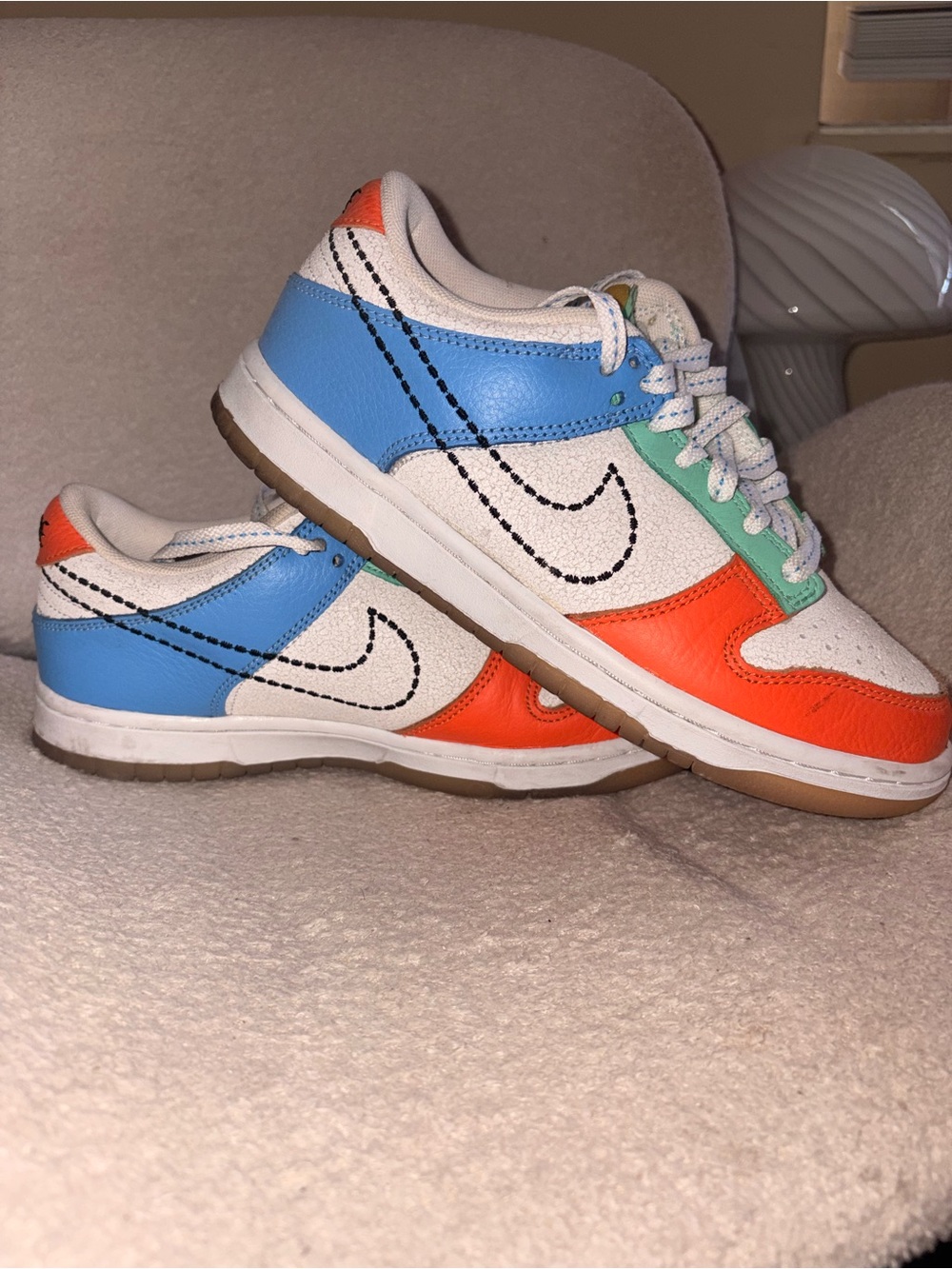 Nike Kids Low-Top Sneakers in White, Orange & Sky Blue with Green Accent